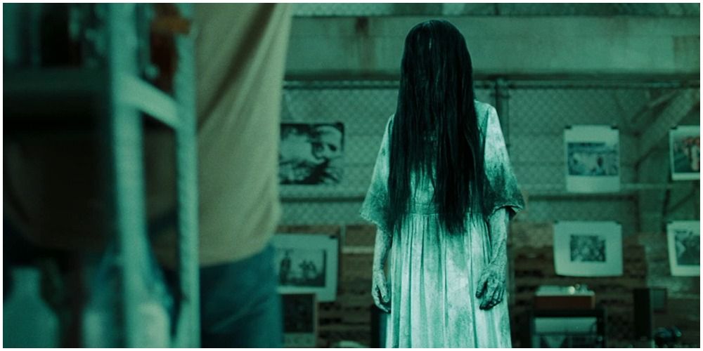 Girl Standing With Hair In Her Face