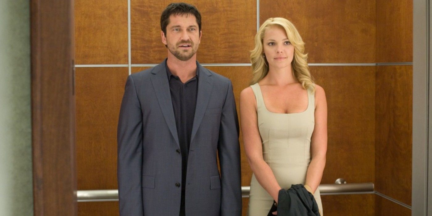 Abby and Mike stand in the elevator while avoiding eye contact in The Ugly Truth.