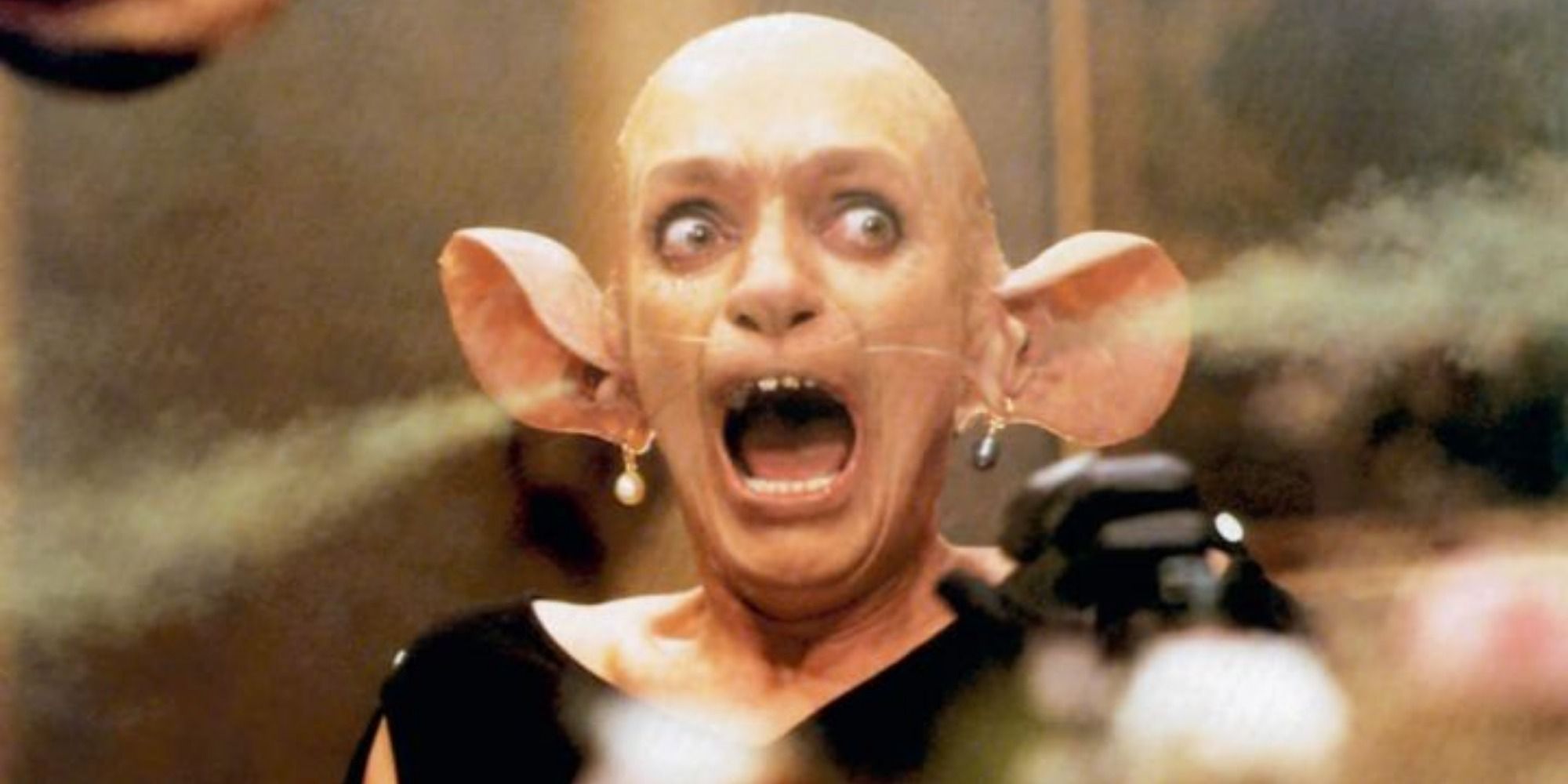 A screenshot of one of the witches about to be turned into a mouse in The Witches (1990)