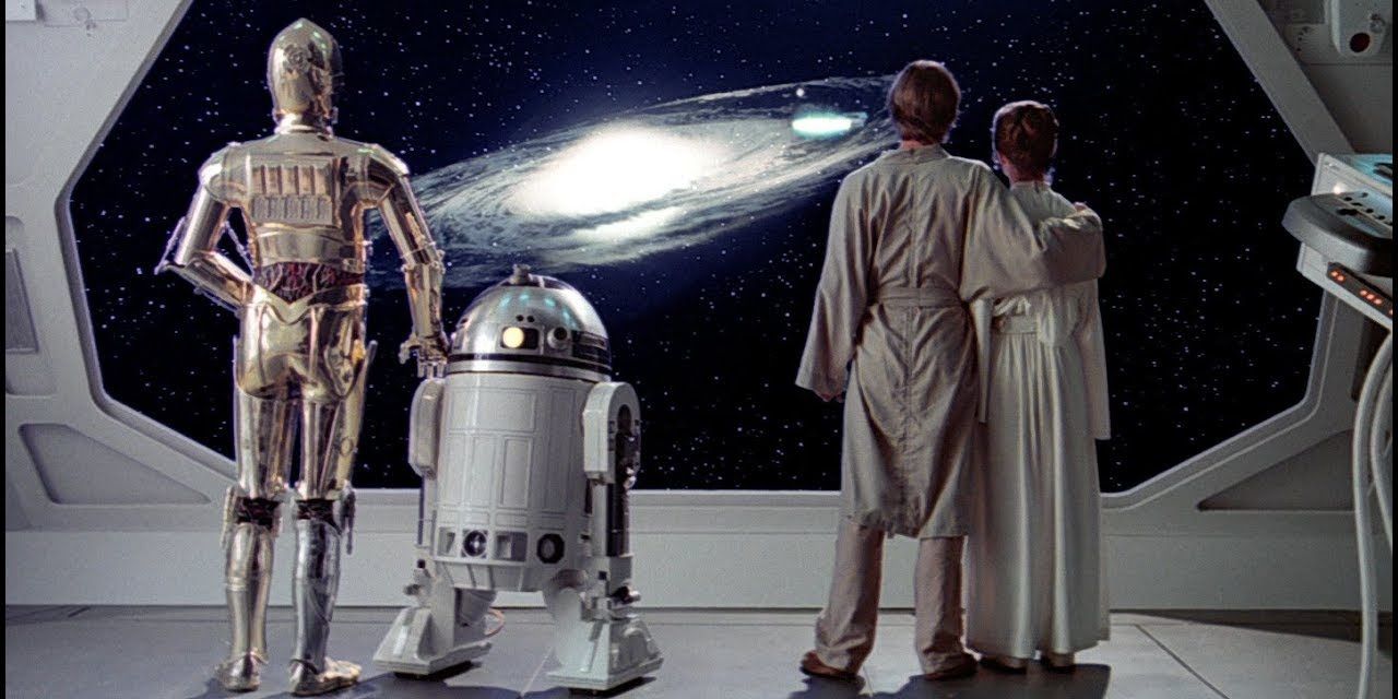 Luke, Leia, and the droids stare into space in The Empire Strikes Back