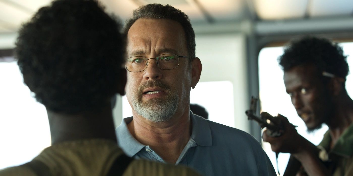 Tom Hanks as Richard Phillips confronting pirates in Captain Phillips.
