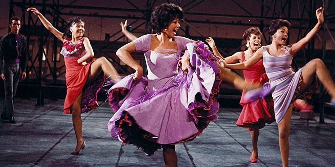 Rita and her group singing and dancing America in West Side Story 1961