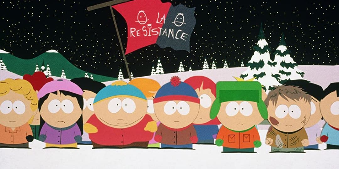 The kids from South Park stand in front of a flag in the snow in Bigger, Longer, and Uncut