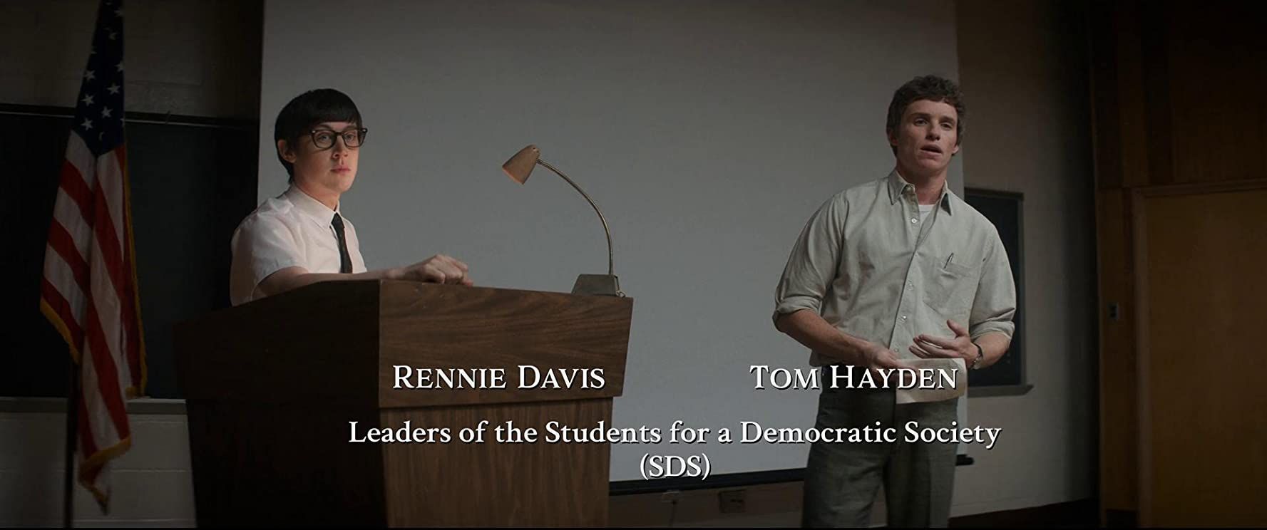 Alex Sharp as Rennie Davis alongside Eddie Redmayne
