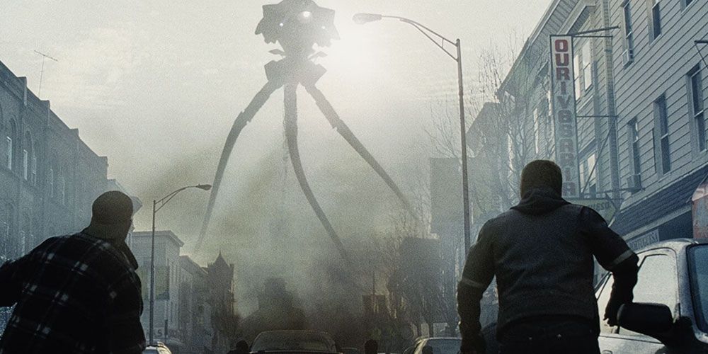 Two people look at an alien creature in War of the Worlds