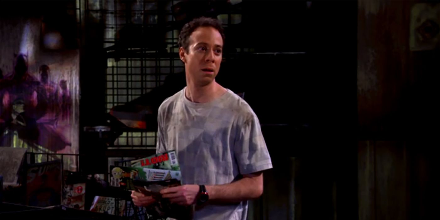 Stuart standing in the middle of his burned down comic book store in The Big Bang Theory.
