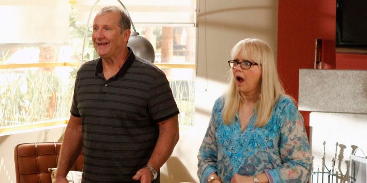 Dede and Jay staring in shock off camera on Modern Family