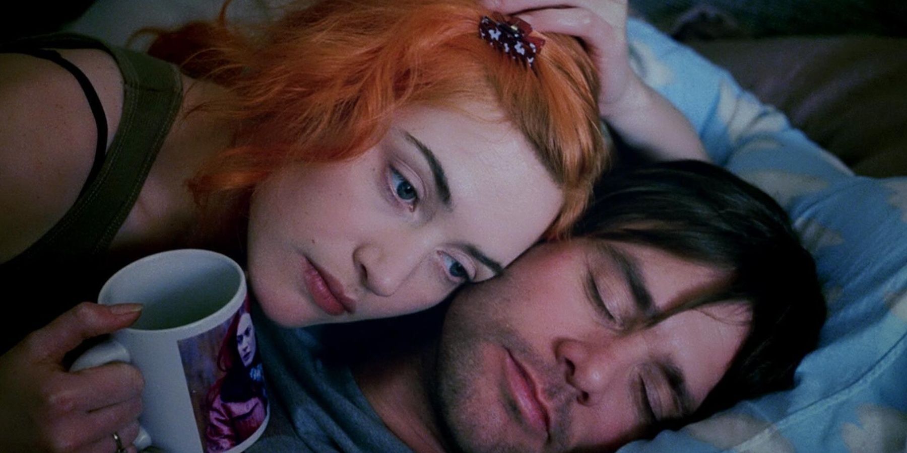 Clementine and Joel in bed
