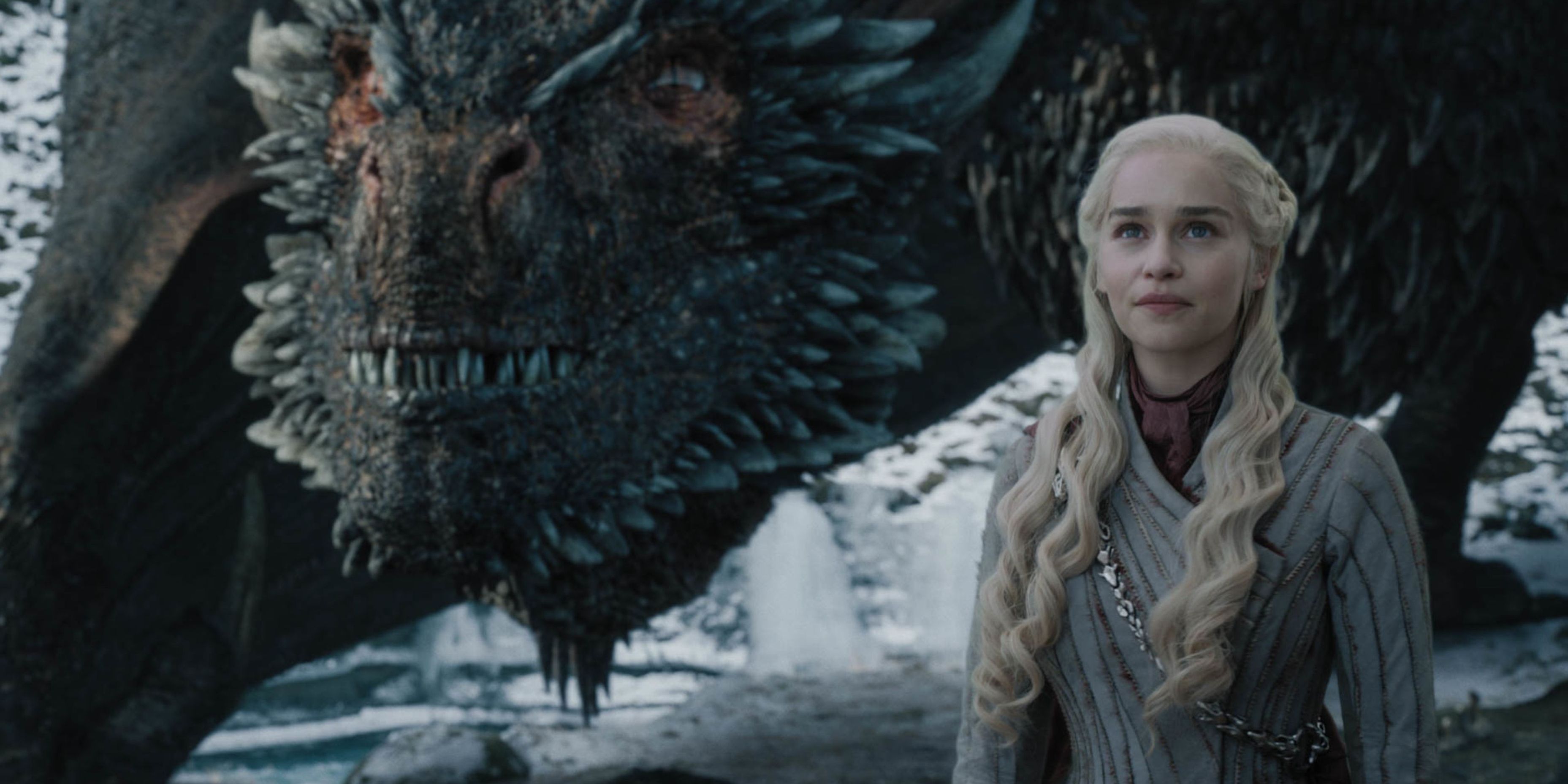 Daenerys standing next to Drogon in Game Of Thrones