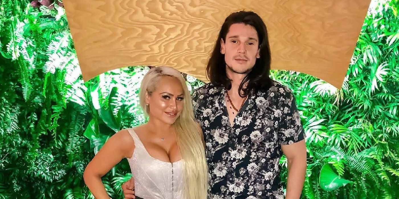 Darcey Silva and Georgi Rusev from the 90 Day Fiance franchise stand together against a green backdrop