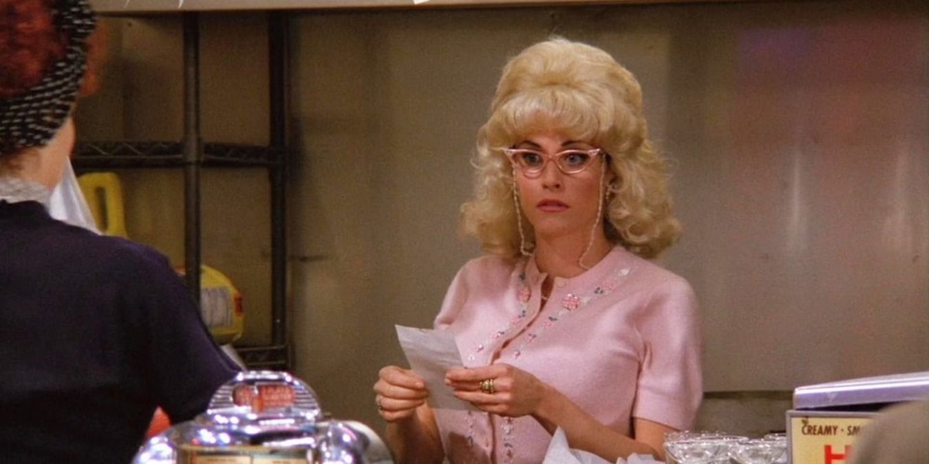 Monica in a wig and costume at the Moondance Diner in Friends