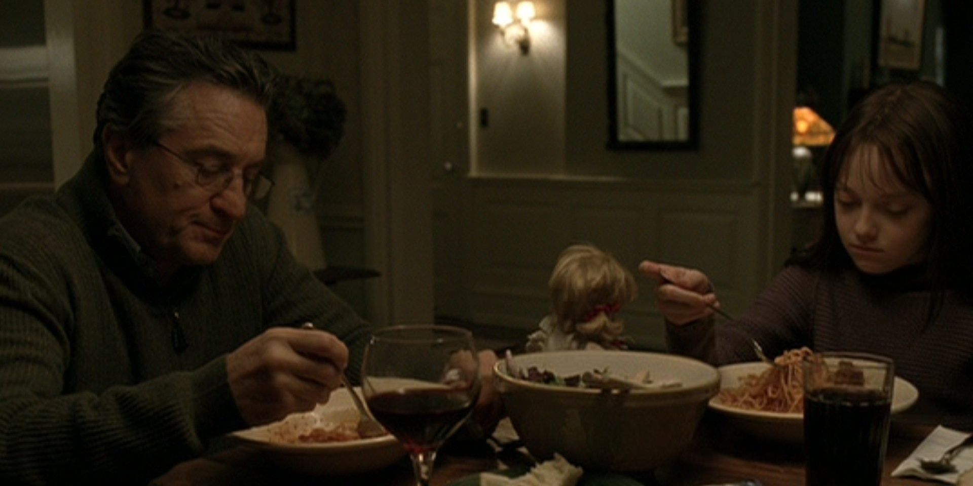 David and Emily Callaway in Hide and Seek sitting at the dinner table.
