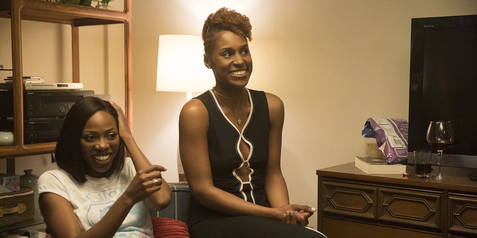 Issa and her friend laughing in Insecure