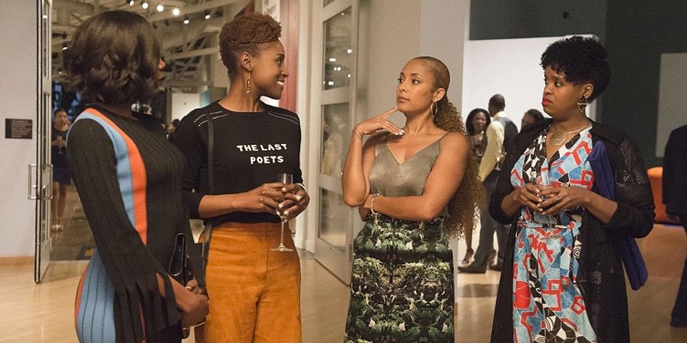 issa wearing the last poets shirt on insecure