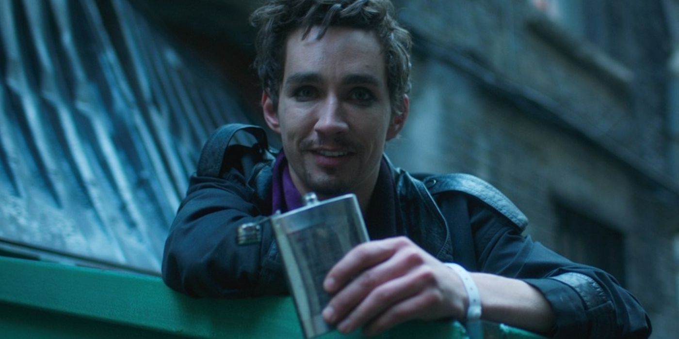 Klaus in the dumpster with a flask