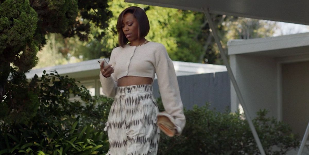 molly in a skirt and a top on insecure