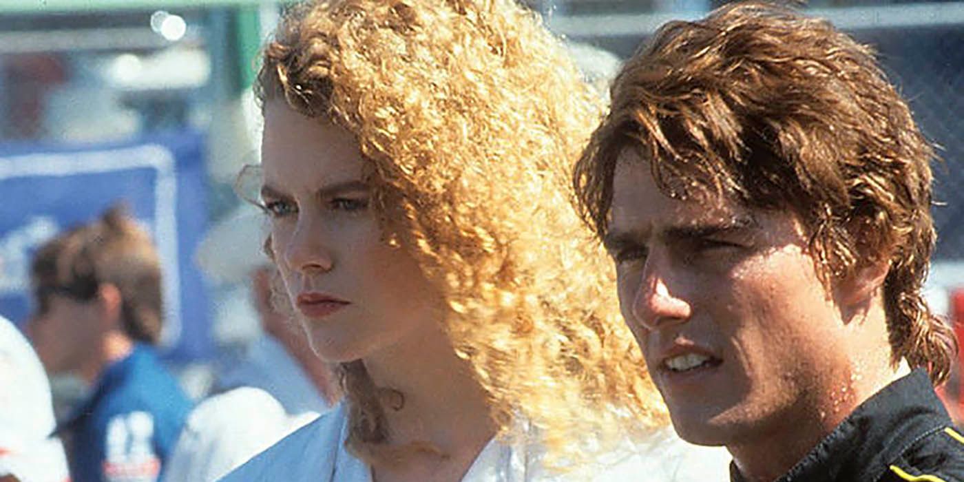 Nicole Kidman Tom Cruise look on at the race track in Days of Thunder