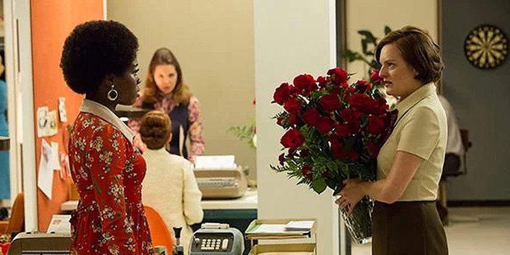 peggy and shirley with roses for valentine's day on mad men