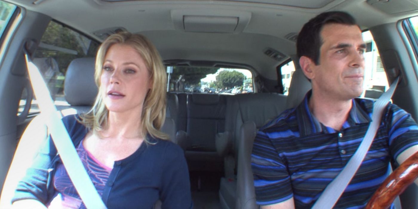 Claire and Phil sitting in the car on Modern Family
