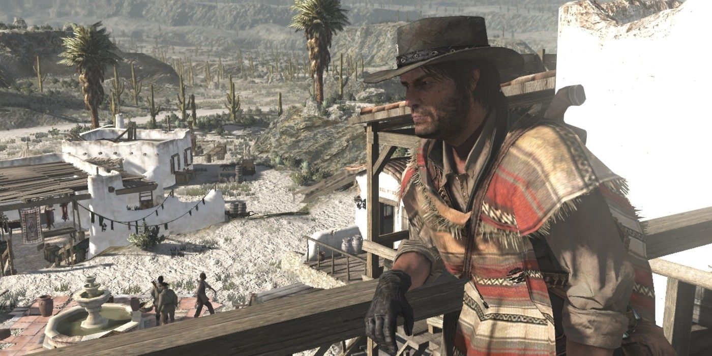John Marston standing on a balcony in a Mexican town in a cut portion of Red Dead Redemption 2's map.