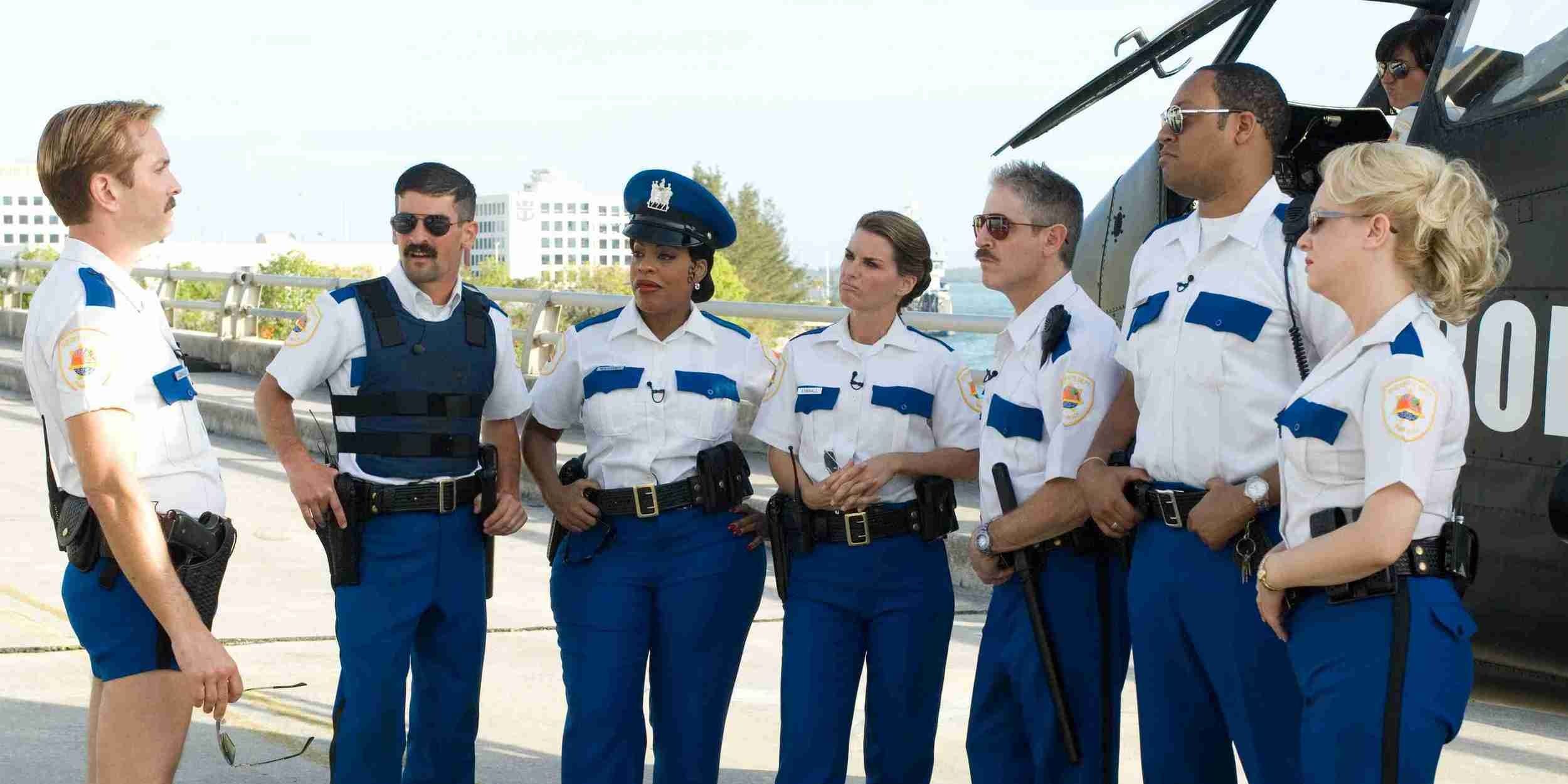 The cast of Reno 911 Miami, being briefed by Jim