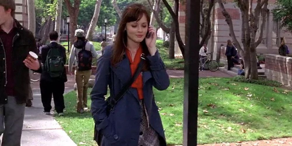 rory in a blue trenchcoat on gilmore girls
