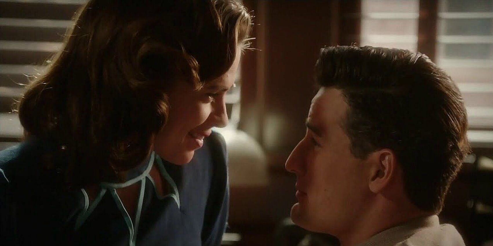 Peggy Carter and Daniel Sousa about to kiss