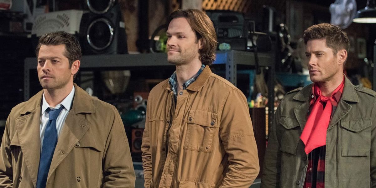 Sam, Dean and Castiel on Supernatural with hands in their pockets.