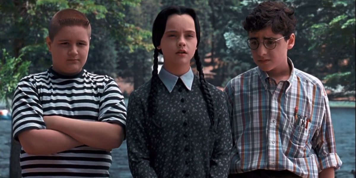 Wednesday and Pugsley Addams and Joel Glicker in The Addams Family Values