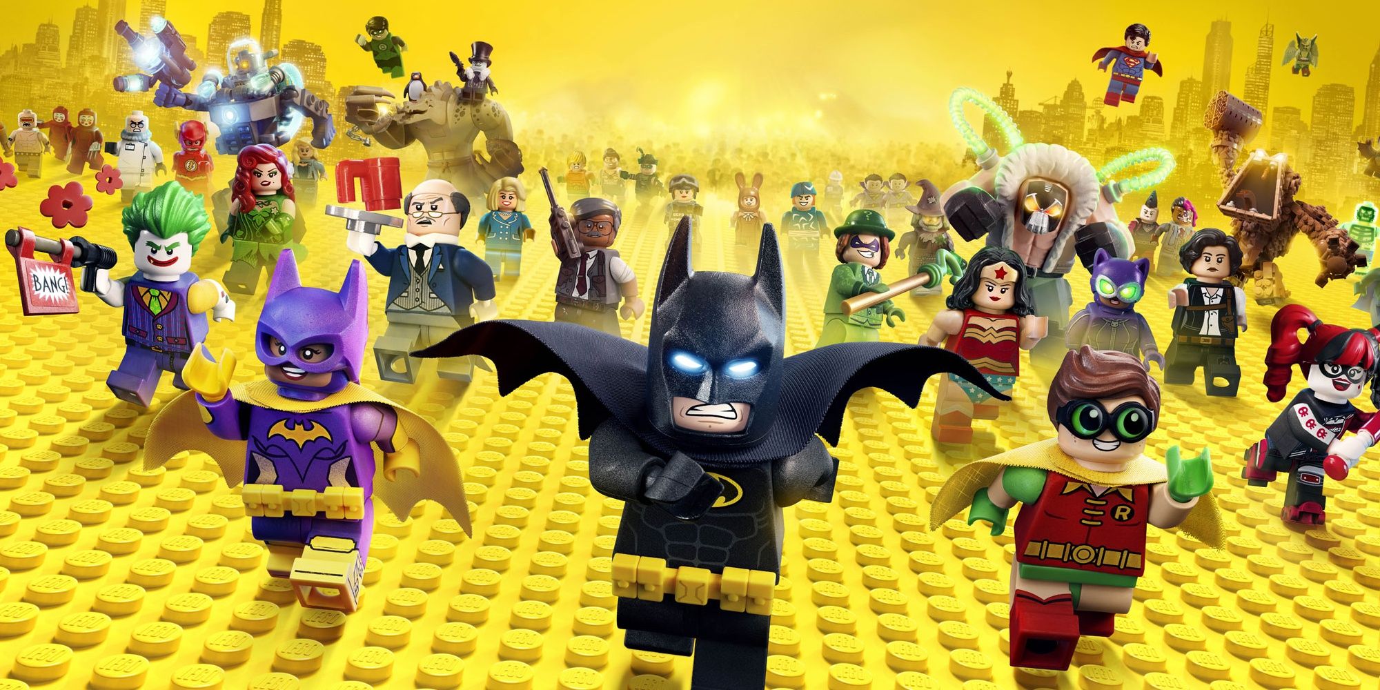 Lego Batman Movie promo art featuring the Batfamily and villains