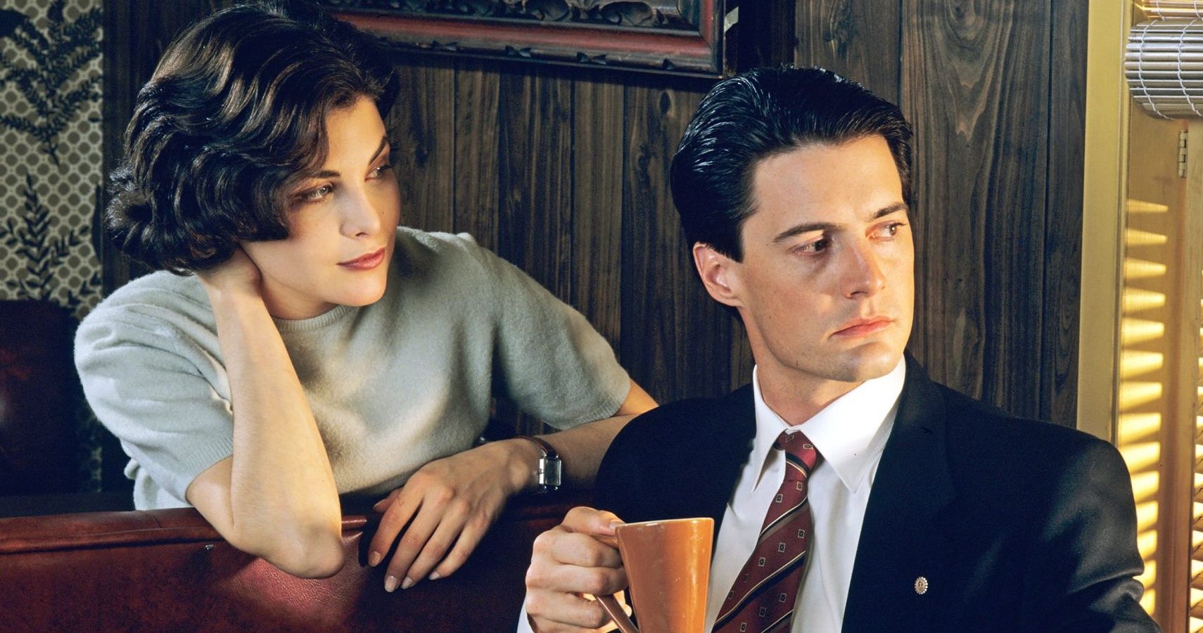 Dale Cooper and Audrey Horne looking out a window