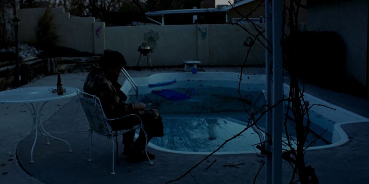 walter white sits at his pool on breaking bad