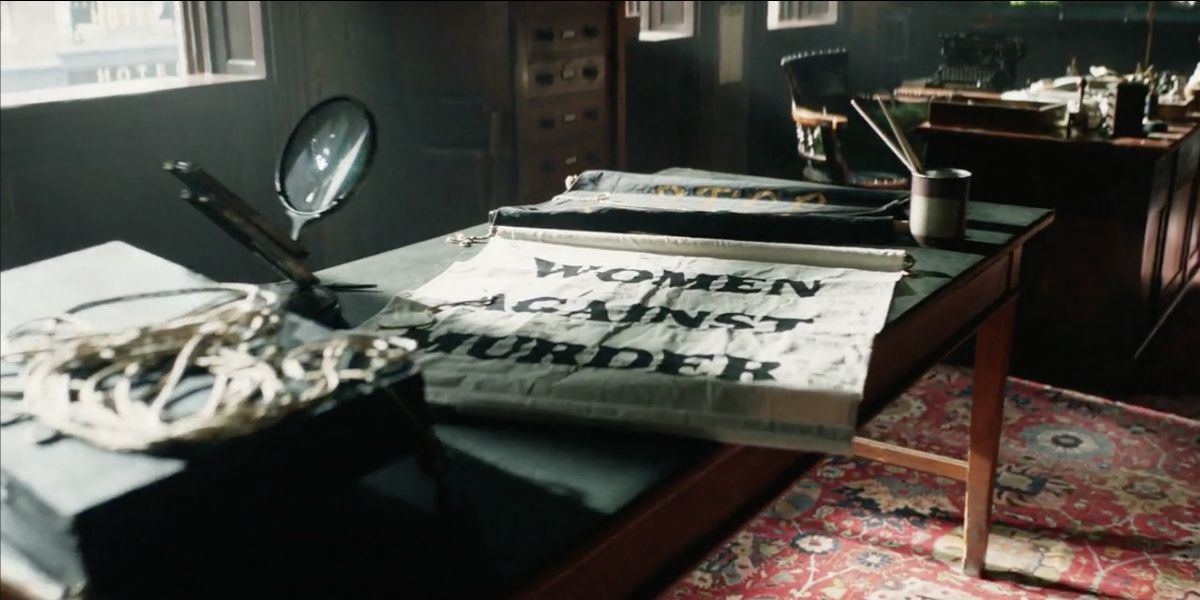 Rally Banners in Sara's office season 2 episode 1, the alienist 