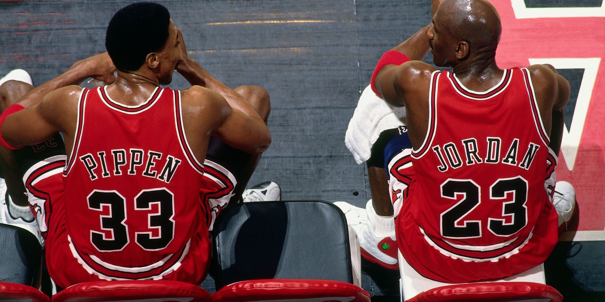 Scottie Pippen and Michael Jordan sit side by side