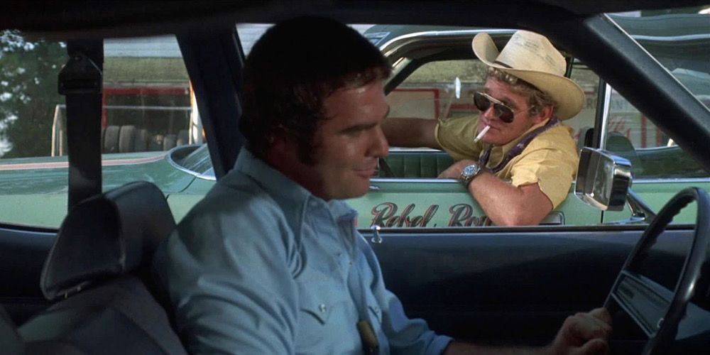 Burt Reynolds driving a car in White Lightning