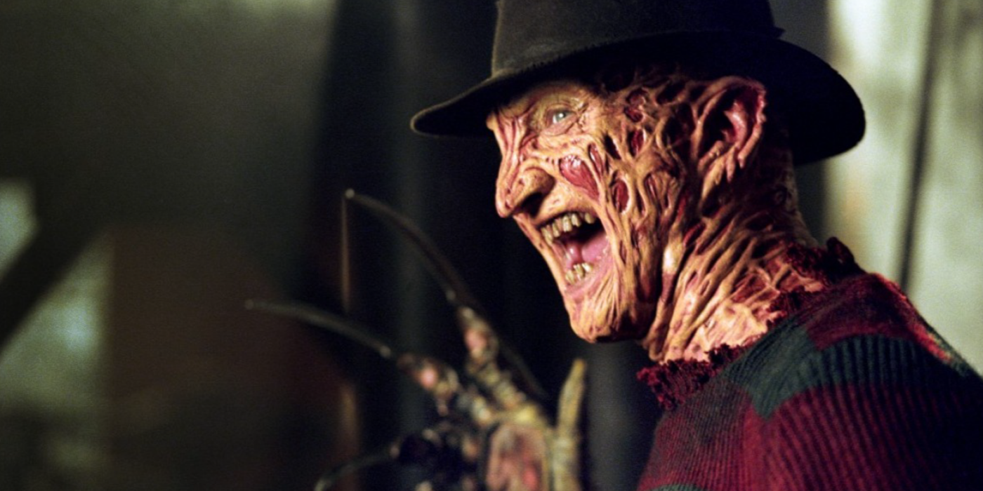 Robert Englund as Freddy brandishing knife fingers in A Nightmare on Elm Street
