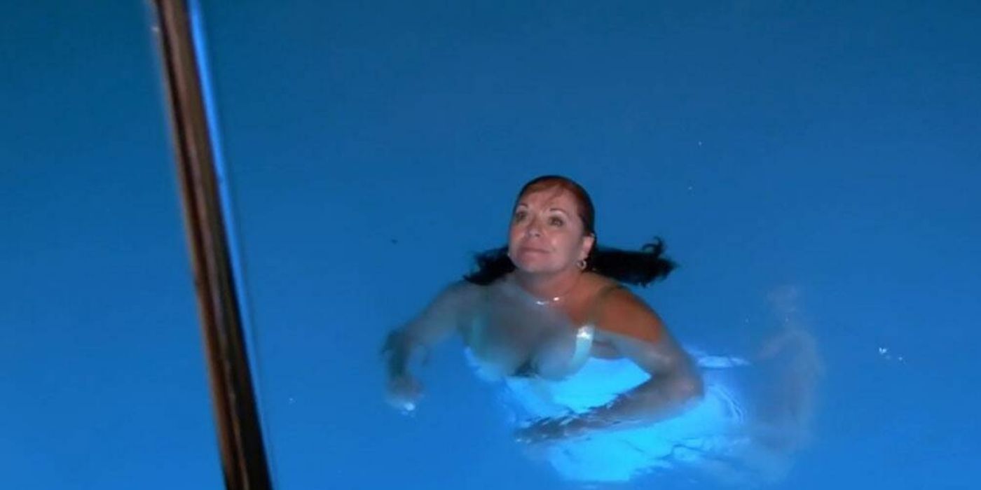 A guest swimming in the ocean at night on Below Deck