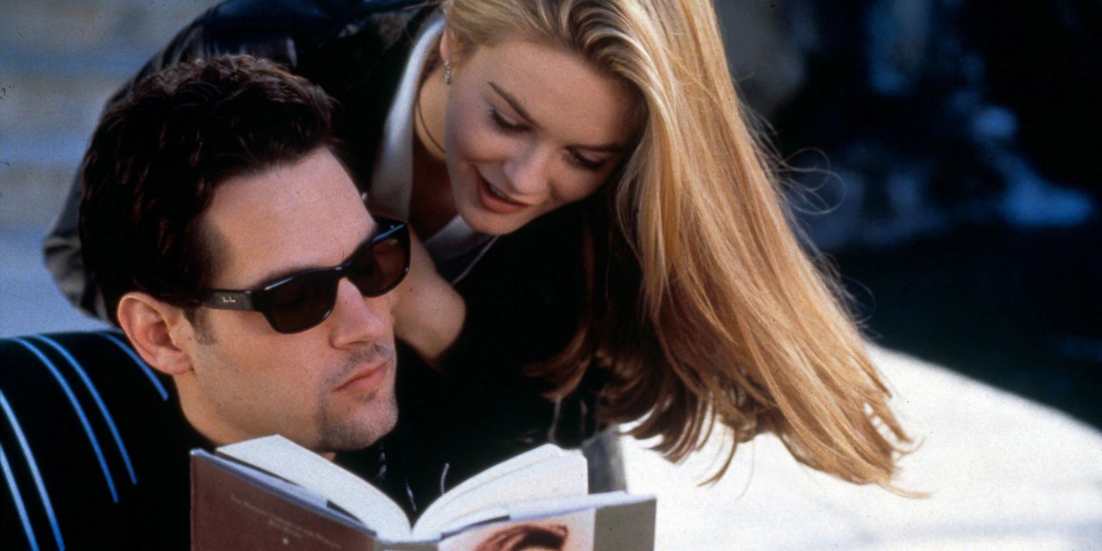 Cher reads Josh's book over his shoulder in Clueless
