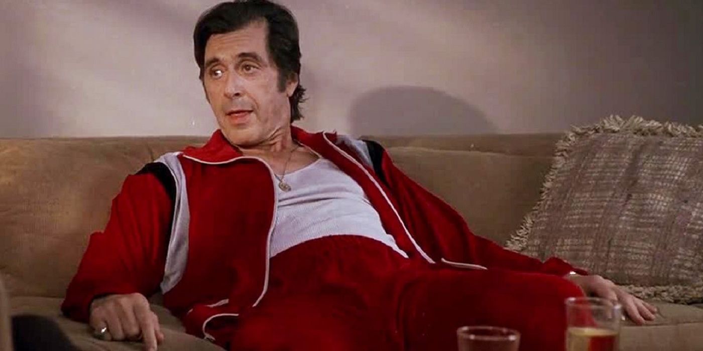 Al Pacino's Lefty sits on a couch in Donnie Brasco
