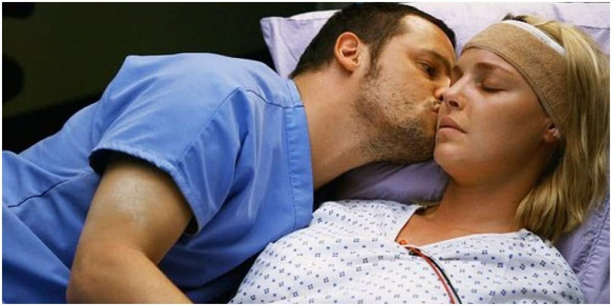 Alex kissing Izzie after her brain surgery