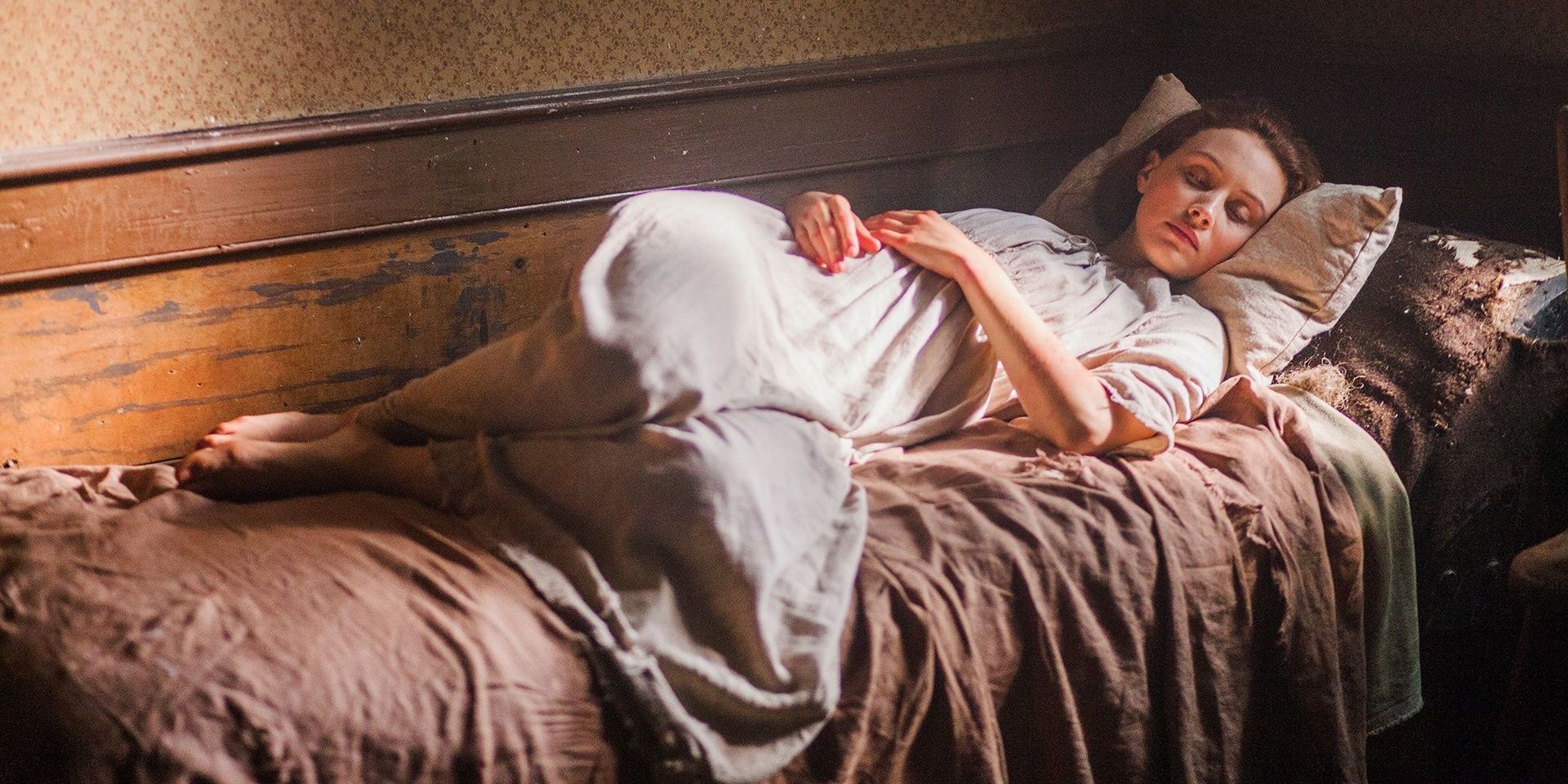 Grace Marks from Alias Grace sleeps on her bed