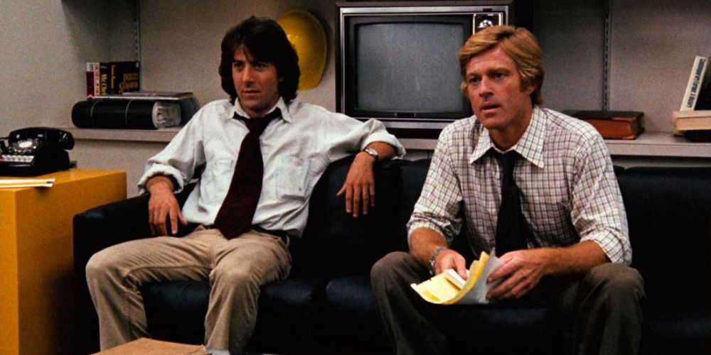 Rob and Carl sit on the couch in All The President's Men