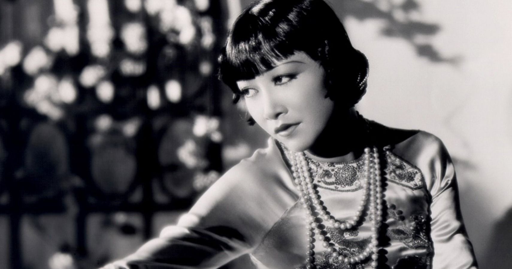 A screenshot of Anna May Wong in her first sound film, Daughter of the Dragon (1931)