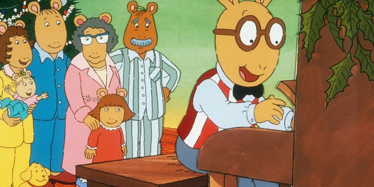 Arthur gets a piano on Christmas morning with his family watching