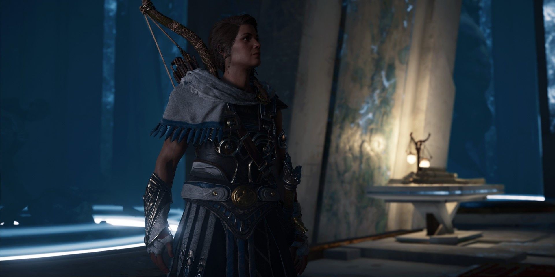 Kassandra exploring a temple at night in Assassin's Creed Odyssey.