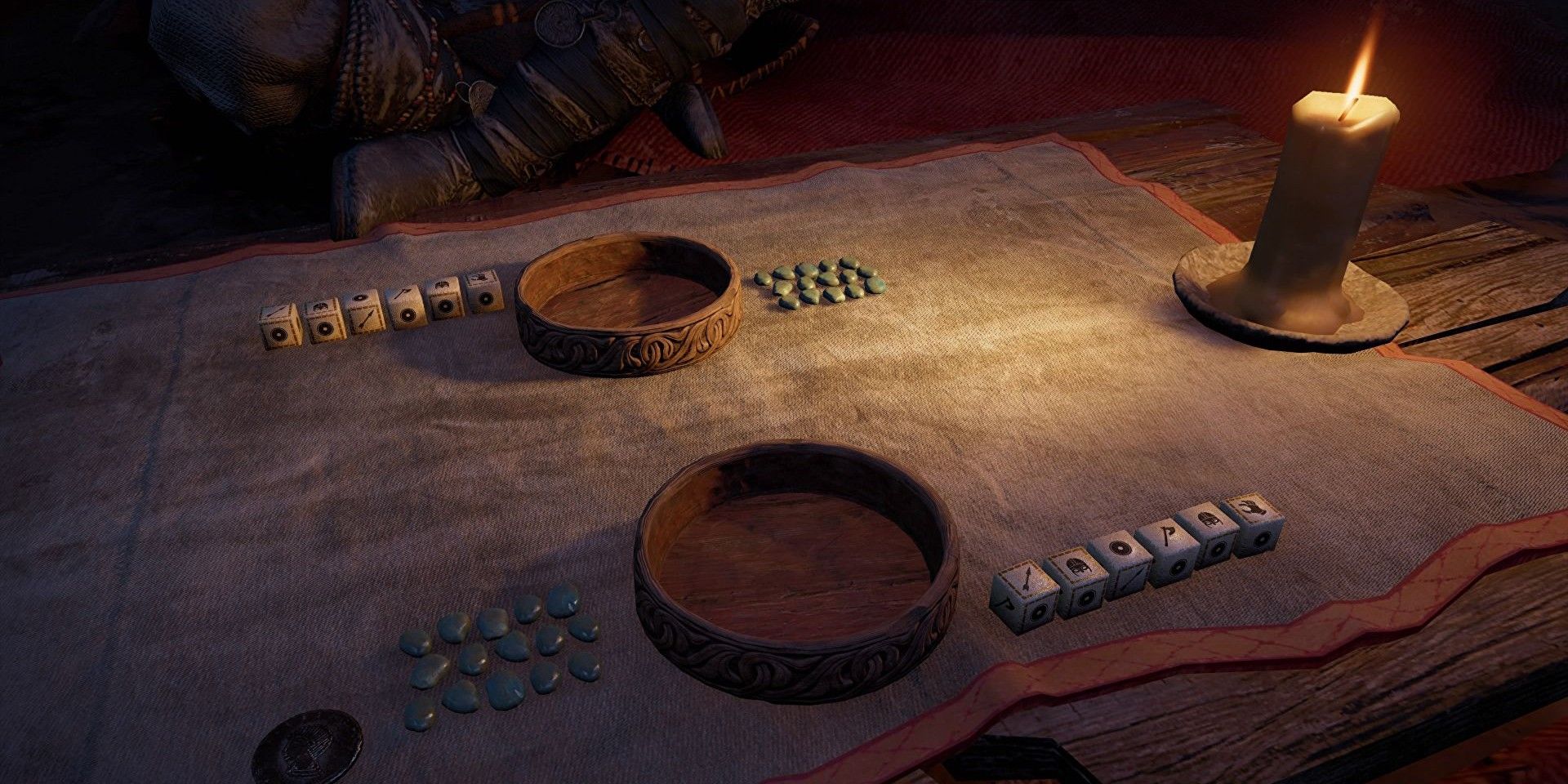 Bowls and dice on a table for a game of Orlog in the video game, Assassin's Creed Valhalla