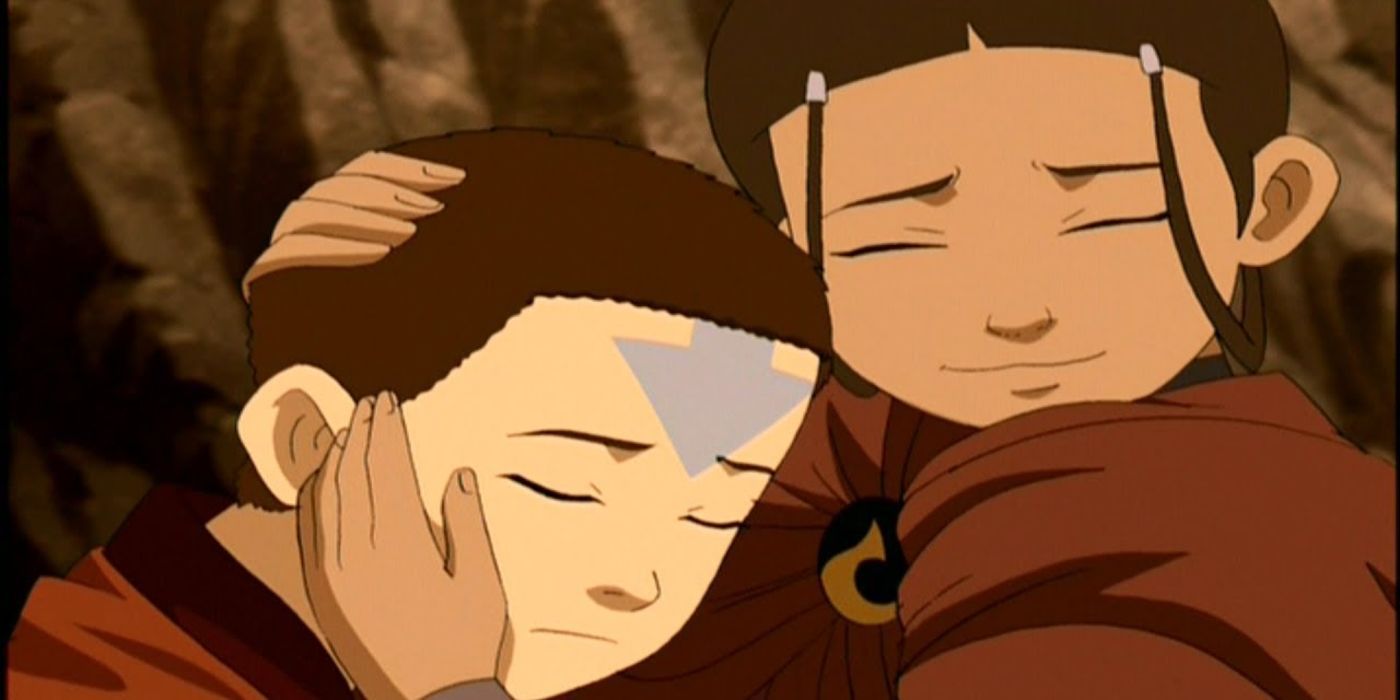 Aang and Katara hugging in the last airbender