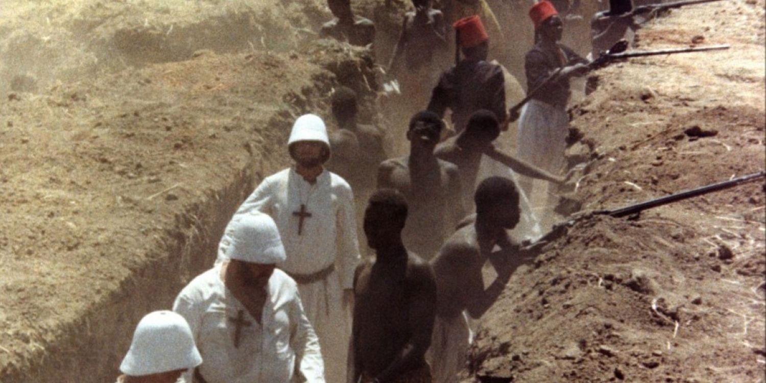 White men forcing black men to shoot in battle in Black and White In Color