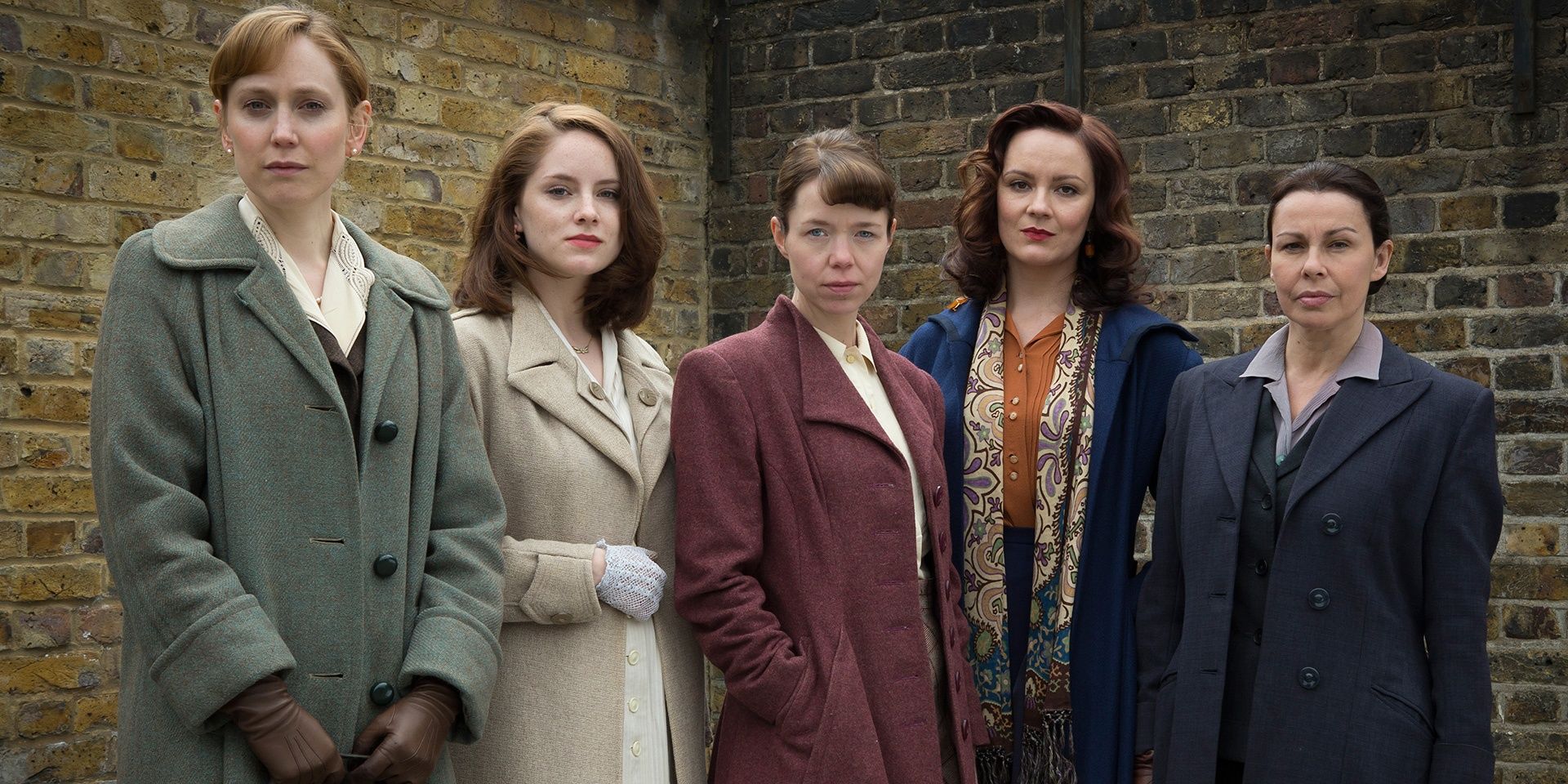 The women of Bletchley Circle against a brick wall