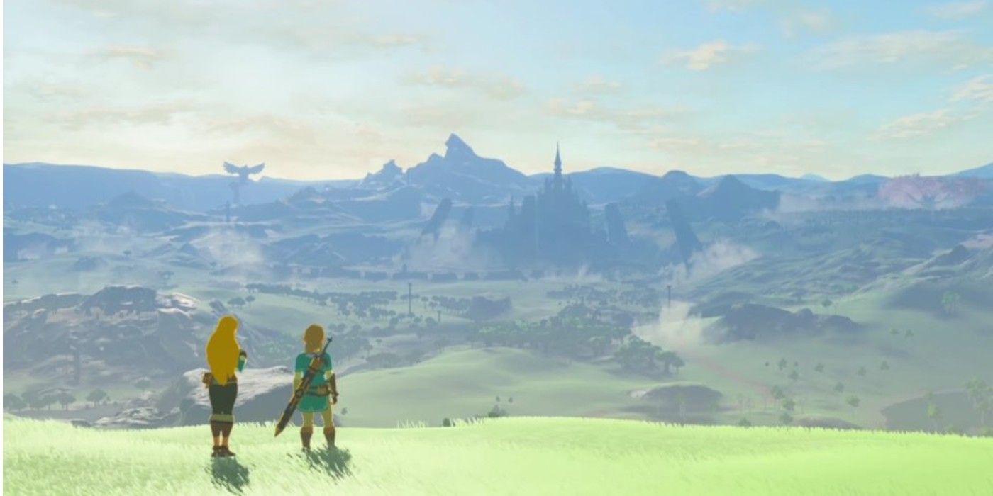 Link and Zelda staring at the land of Hyrule on the edge of a cliff